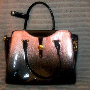 Beautiful pink glitter and black purse